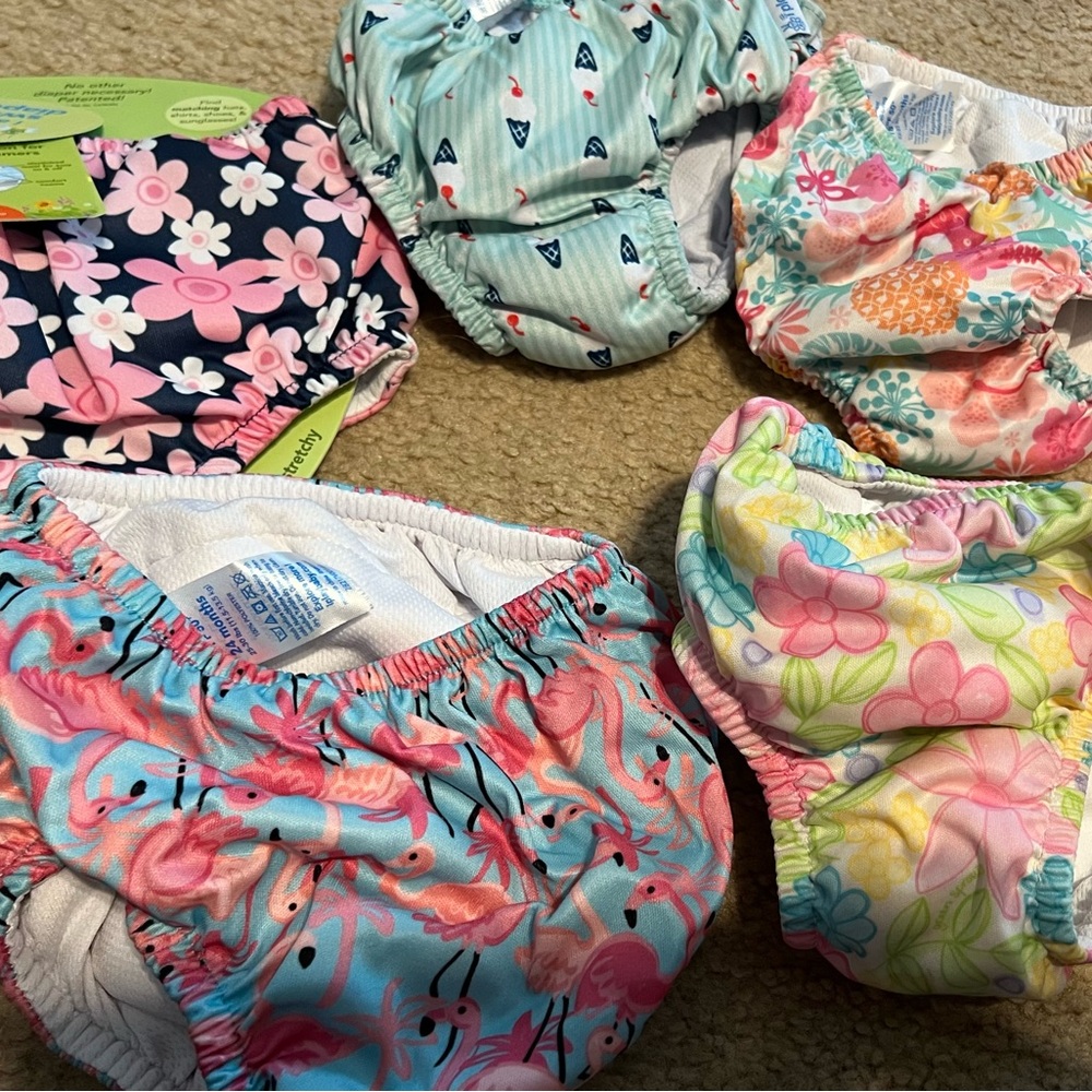 Lot of 5 swim diapers - girls sizes 12-24 months and 4T